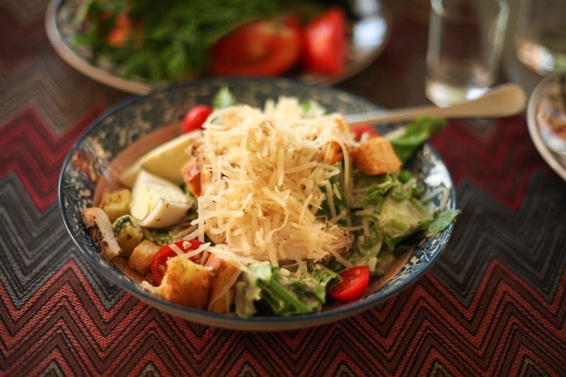 Classic Caesar salad with croutons and Parmesan
